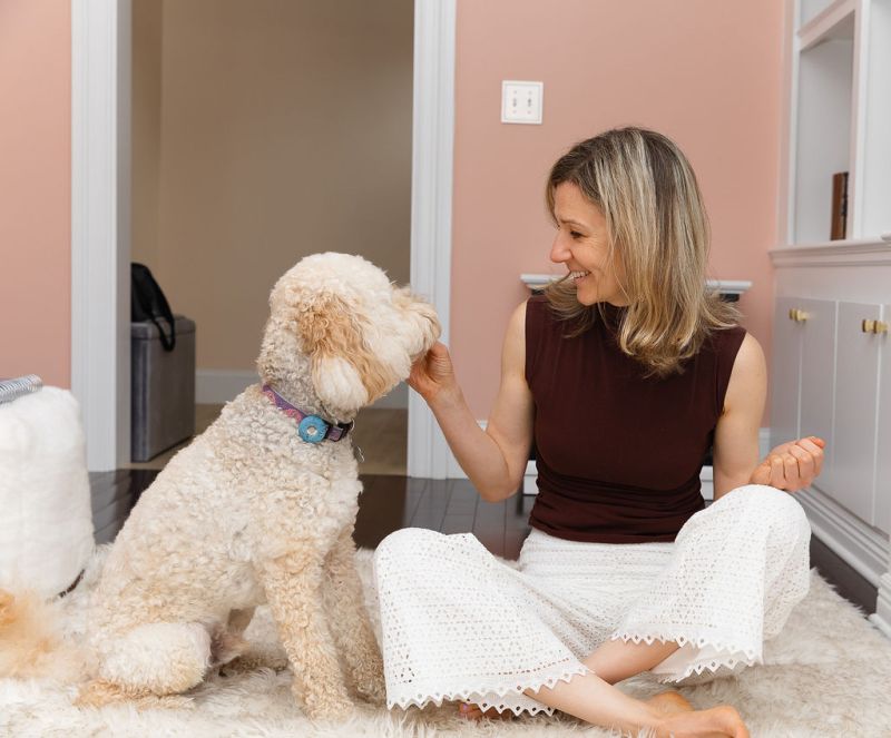 Dasha at home with her dog